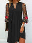 Nivara™ | Elegant Mini Dress with V-neck and Sheer Sleeves