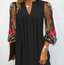 Nivara™ | Elegant Mini Dress with V-neck and Sheer Sleeves